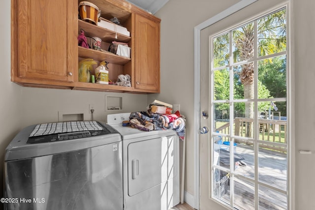270 N Jenkins St, Holly Ridge, NC 28445 - washroom with cabinet space and separate washer and dryer