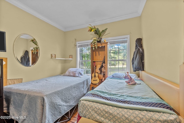 270 N Jenkins St, Holly Ridge, NC 28445 - bedroom featuring crown molding and wood finished floors