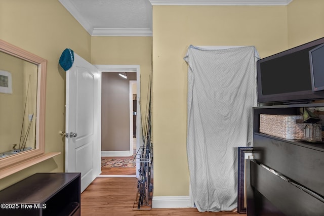 270 N Jenkins St, Holly Ridge, NC 28445 - bedroom with crown molding, wood finished floors, and baseboards