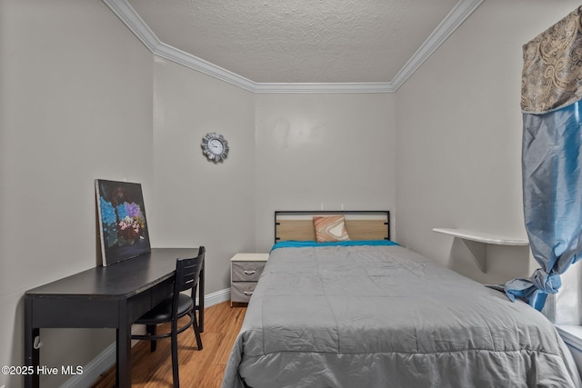 270 N Jenkins St, Holly Ridge, NC 28445 - bedroom with crown molding, wood finished floors, a textured ceiling, and baseboards