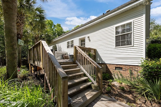 270 N Jenkins St, Holly Ridge, NC 28445 - wooden deck featuring stairs