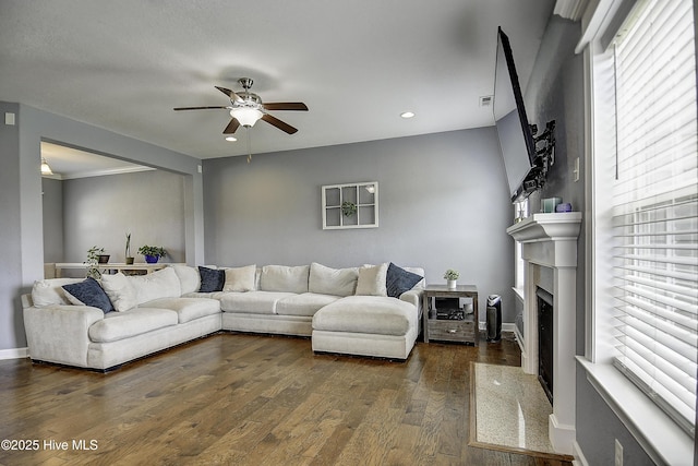 115 Elrod Rd, Moyock, NC 27958 - living room featuring a ceiling fan, dark wood-style flooring, a fireplace with flush hearth, and recessed lighting