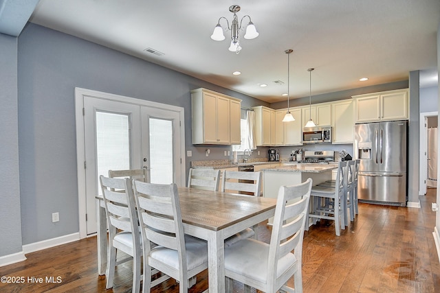 115 Elrod Rd, Moyock, NC 27958 - dining room with dark wood-style floors, baseboards, recessed lighting, french doors, and a chandelier