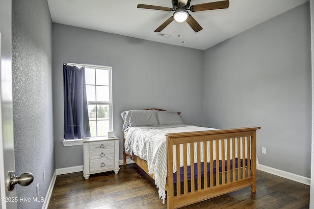 115 Elrod Rd, Moyock, NC 27958 - bedroom with hardwood / wood-style floors, baseboards, and a ceiling fan
