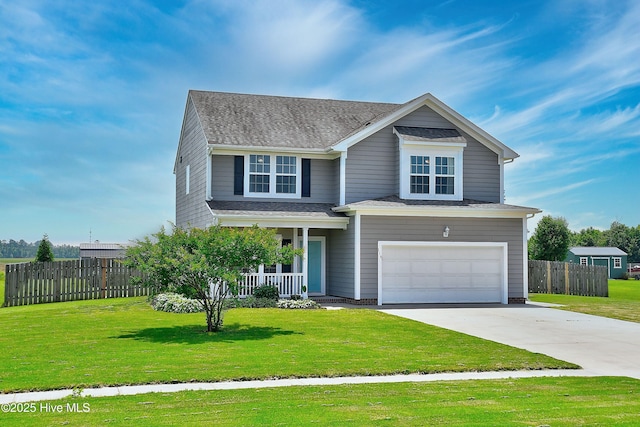 115 Elrod Rd, Moyock, NC 27958 - traditional home with a porch, concrete driveway, a garage, and a shingled roof