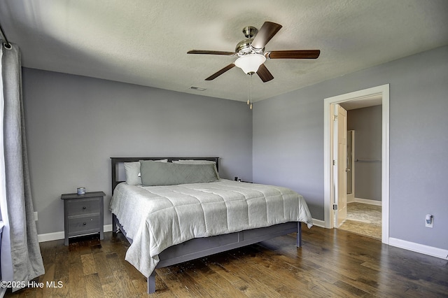 115 Elrod Rd, Moyock, NC 27958 - bedroom featuring wood finished floors, baseboards, a textured ceiling, and a ceiling fan