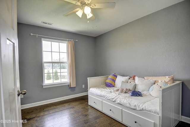 115 Elrod Rd, Moyock, NC 27958 - bedroom with dark wood-style floors, baseboards, and ceiling fan