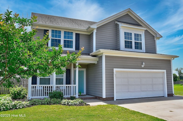 115 Elrod Rd, Moyock, NC 27958 - traditional-style home with a garage, a porch, concrete driveway, and roof with shingles