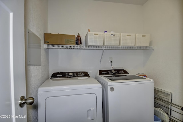 115 Elrod Rd, Moyock, NC 27958 - washroom featuring washing machine and clothes dryer and a textured wall