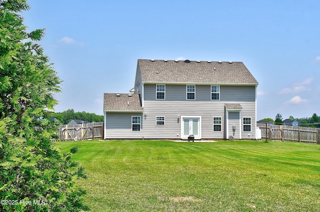 115 Elrod Rd, Moyock, NC 27958 - rear view of house with french doors, a patio area, and roof with shingles