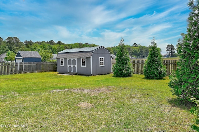115 Elrod Rd, Moyock, NC 27958 - view of yard with a storage unit and an outdoor structure
