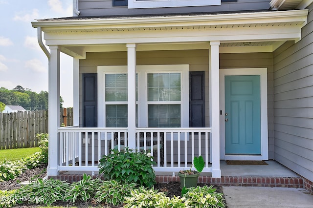115 Elrod Rd, Moyock, NC 27958 - doorway to property with covered porch and fence