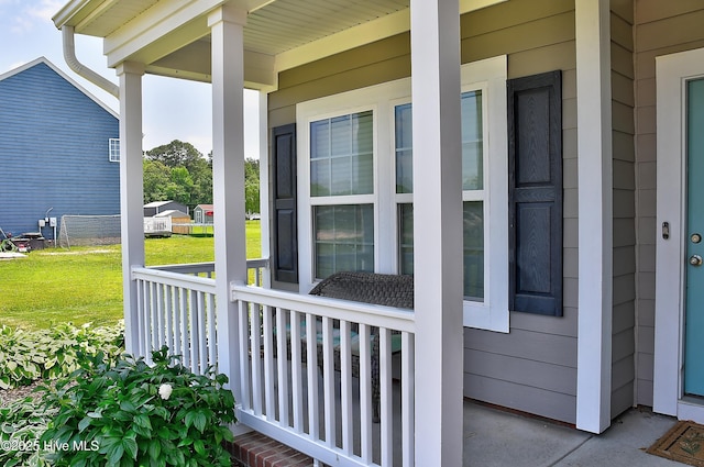115 Elrod Rd, Moyock, NC 27958 - entrance to property featuring a porch and a yard