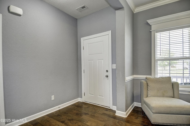 115 Elrod Rd, Moyock, NC 27958 - foyer featuring dark wood-style flooring, baseboards, and crown molding