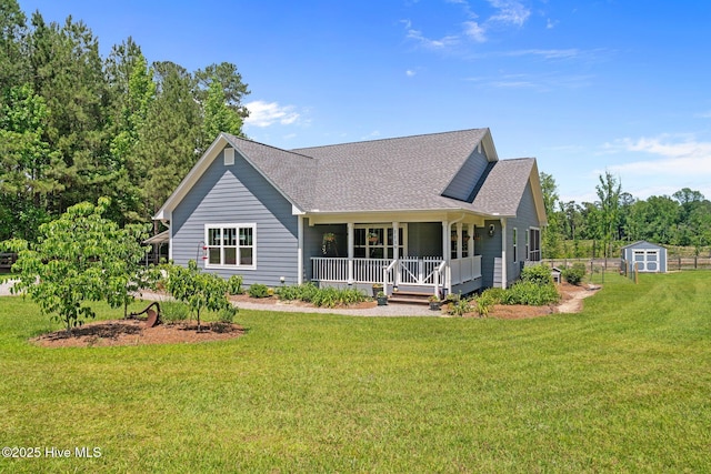 1139 Cranes Creek Rd, Cameron, NC 28326 - back of property featuring a yard, a shingled roof, and covered porch