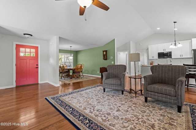 1139 Cranes Creek Rd, Cameron, NC 28326 - living area featuring vaulted ceiling, wood finished floors, a ceiling fan, and baseboards