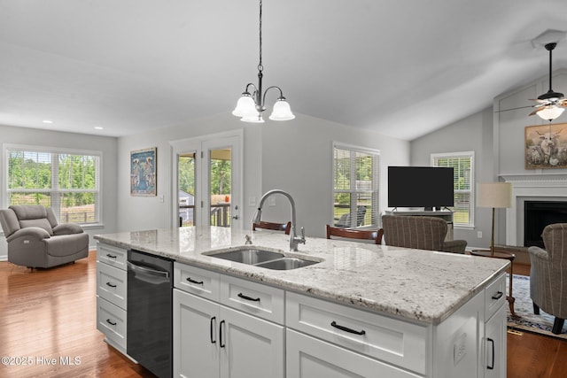 1139 Cranes Creek Rd, Cameron, NC 28326 - kitchen featuring open floor plan, a sink, light wood-style flooring, dishwasher, and vaulted ceiling