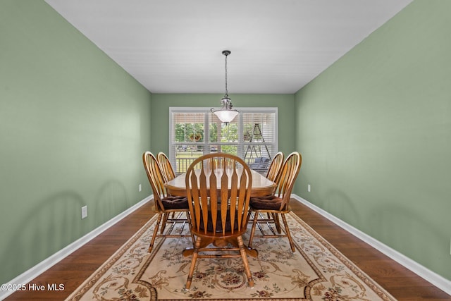 1139 Cranes Creek Rd, Cameron, NC 28326 - dining area with dark wood-type flooring and baseboards