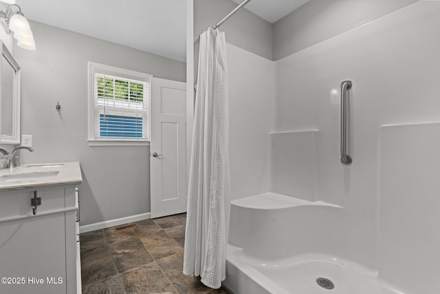 1139 Cranes Creek Rd, Cameron, NC 28326 - bathroom featuring baseboards, a shower with curtain, stone finish flooring, and vanity