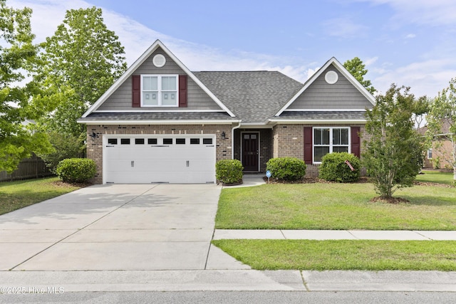 view of front of home with roof with shingles, brick siding, driveway, and a garage