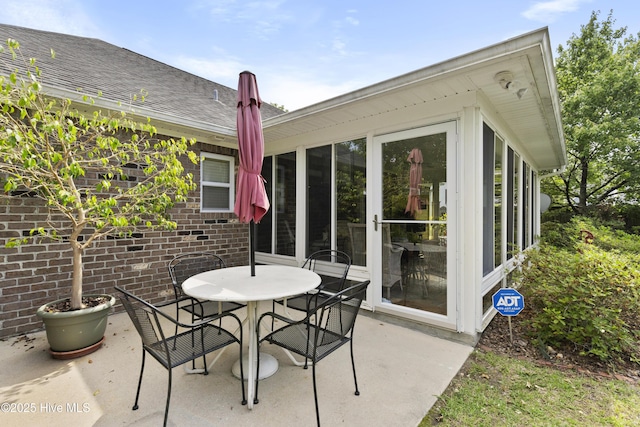 view of patio with outdoor dining area