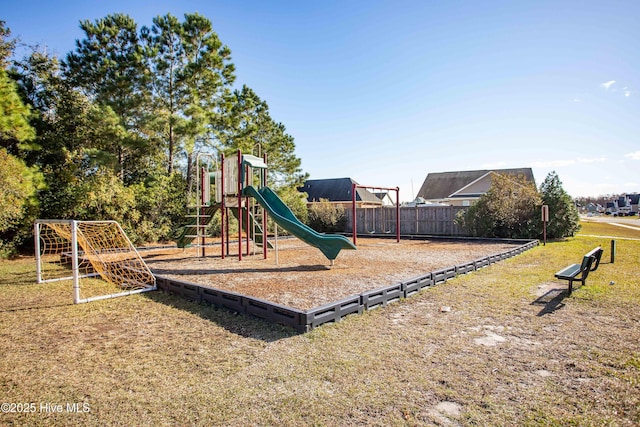 community jungle gym with fence