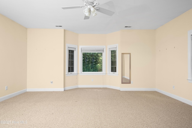 143 Rock Creek Dr, New Bern, NC 28562 - spare room with light carpet, baseboards, and ceiling fan