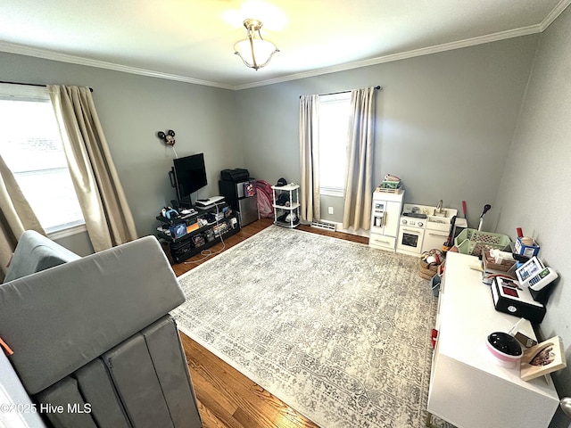 living room featuring ornamental molding and dark wood-style flooring