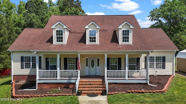 cape cod house featuring covered porch, crawl space, a front yard, and a shingled roof