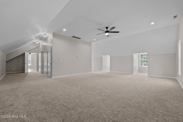 additional living space with lofted ceiling, ceiling fan, carpet, baseboards, and recessed lighting