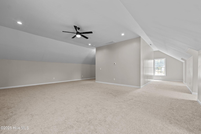 bonus room featuring lofted ceiling, a ceiling fan, light carpet, baseboards, and recessed lighting