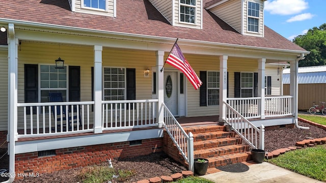property entrance with a porch, roof with shingles, and crawl space