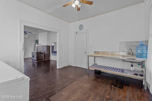511 Herring Ave NE, Wilson, NC 27893 - interior space with ceiling fan and wood finished floors