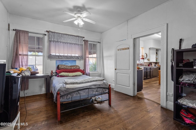 511 Herring Ave NE, Wilson, NC 27893 - bedroom with wood finished floors, a sink, and ceiling fan