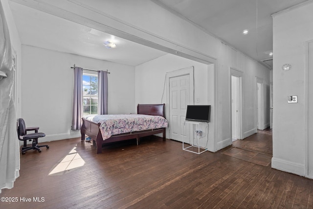 511 Herring Ave NE, Wilson, NC 27893 - bedroom with hardwood / wood-style flooring and baseboards