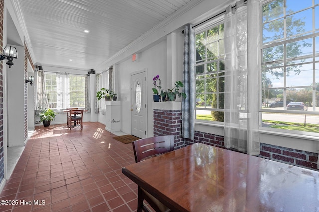 511 Herring Ave NE, Wilson, NC 27893 - sunroom featuring healthy amount of natural light and outdoor dining area