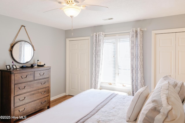 131 Paddle Wheel Cir, Washington, NC 27889 - bedroom featuring wood finished floors, ceiling fan, and baseboards
