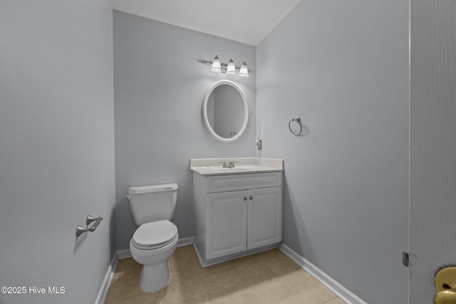 105 E Seabird Ct, Sneads Ferry, NC 28460 - bathroom with vanity, toilet, baseboards, and tile patterned floors