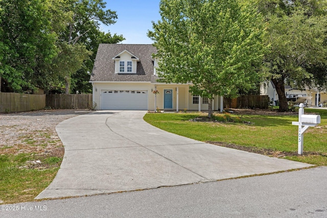 105 E Seabird Ct, Sneads Ferry, NC 28460 - view of front of property with driveway, a shingled roof, and a garage