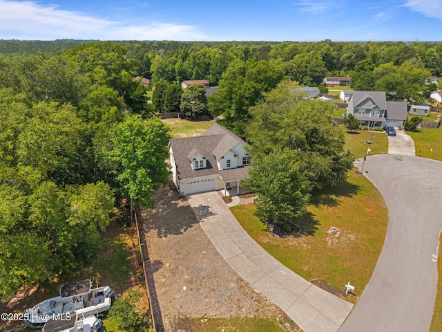 105 E Seabird Ct, Sneads Ferry, NC 28460 - view from above of property featuring a heavily wooded area