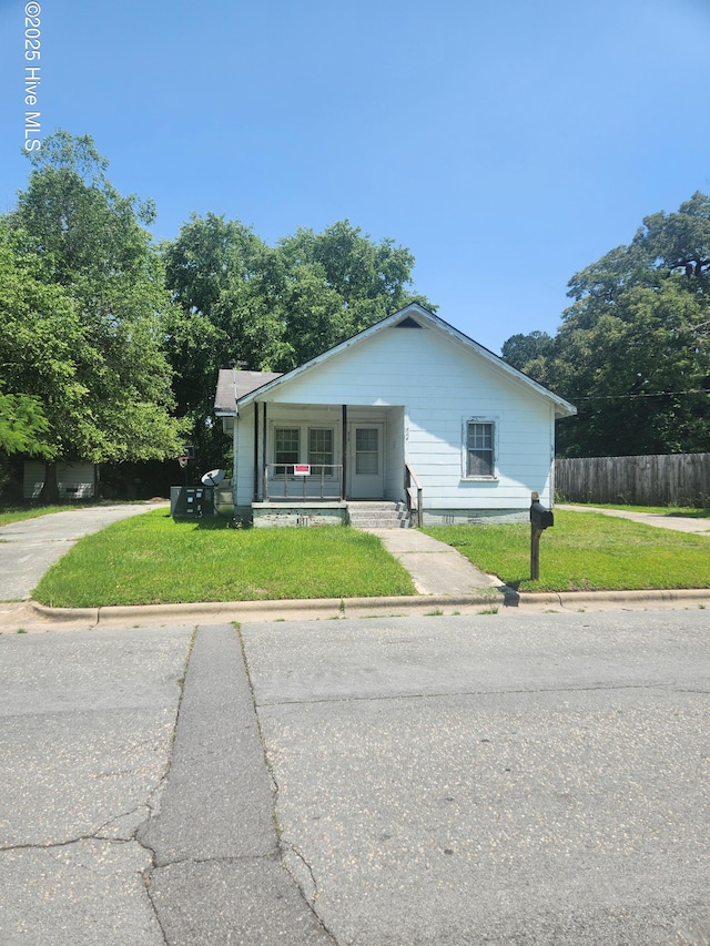 514 Margaret St, Clinton, NC 28328 - bungalow-style house featuring a porch and concrete driveway