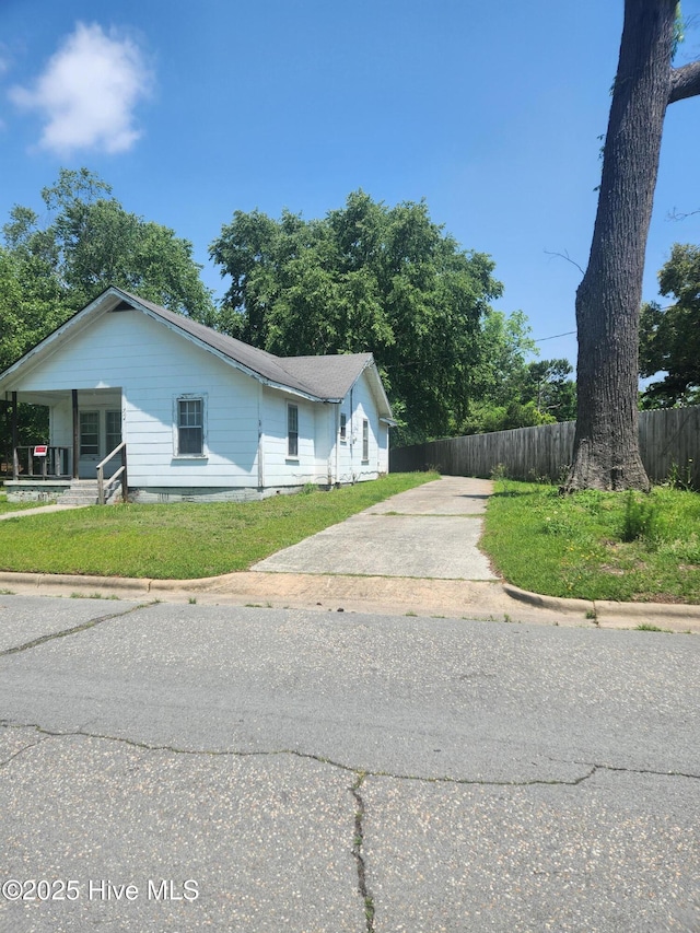 514 Margaret St, Clinton, NC 28328 - view of side of property with concrete driveway and covered porch