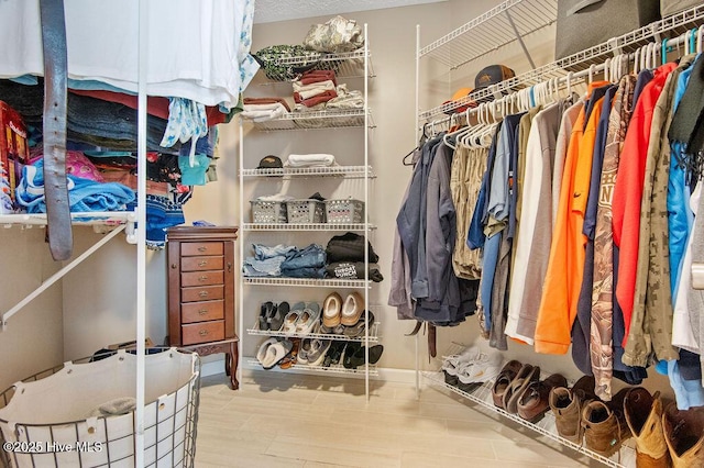 1177 Roberts Rd, Newport, NC 28570 - walk in closet featuring wood finished floors