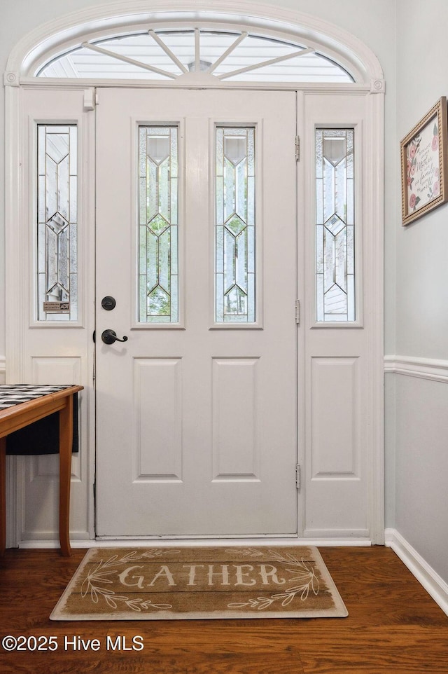 1177 Roberts Rd, Newport, NC 28570 - foyer entrance featuring dark wood-style floors and baseboards