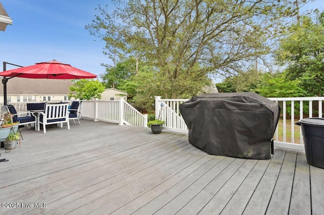 1177 Roberts Rd, Newport, NC 28570 - wooden terrace with outdoor dining space and grilling area
