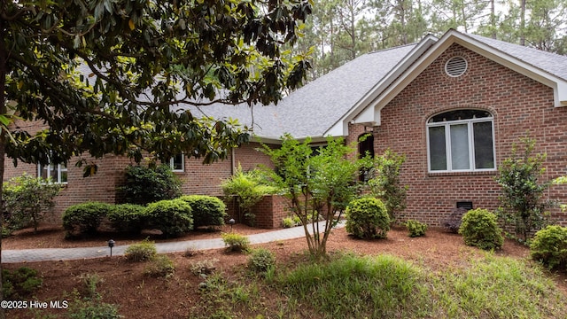 17 Troon Dr, Pinehurst, NC 28374 - view of front of home featuring brick siding, roof with shingles, and crawl space