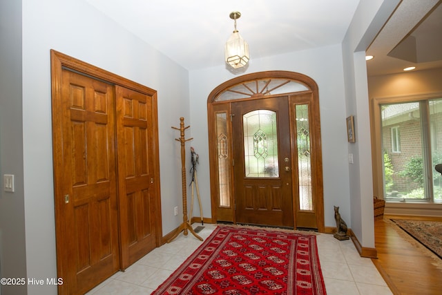 17 Troon Dr, Pinehurst, NC 28374 - entryway featuring light tile patterned flooring and baseboards