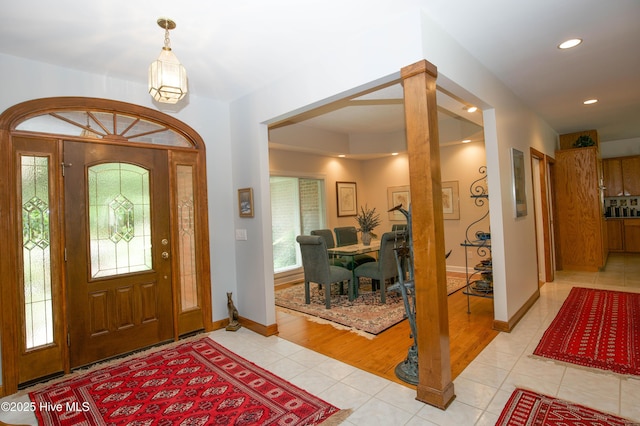 17 Troon Dr, Pinehurst, NC 28374 - foyer featuring light tile patterned floors, baseboards, and recessed lighting