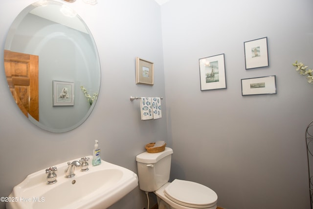 17 Troon Dr, Pinehurst, NC 28374 - half bath with a sink and toilet