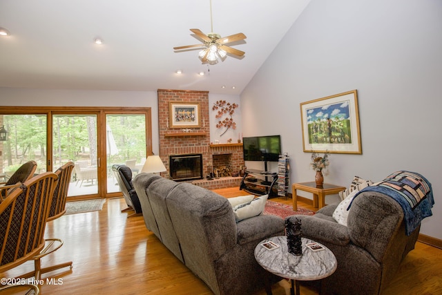 17 Troon Dr, Pinehurst, NC 28374 - living area with ceiling fan, a fireplace, high vaulted ceiling, light wood-type flooring, and recessed lighting